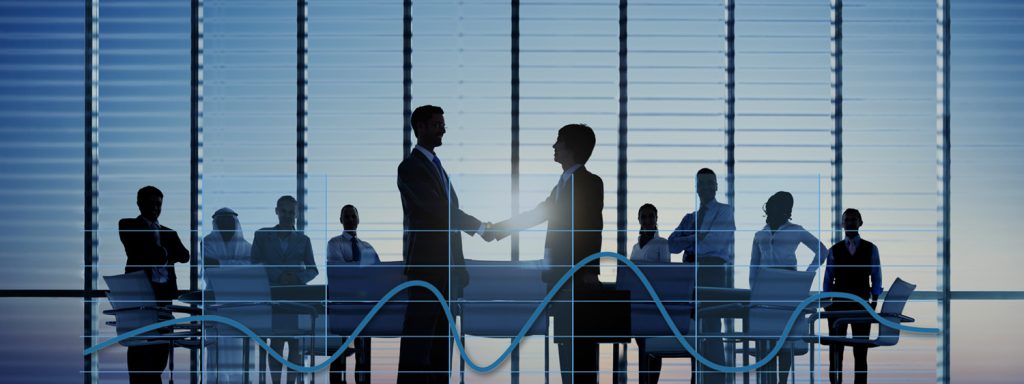 Two Businessmen Having Together With Theri Colleagues