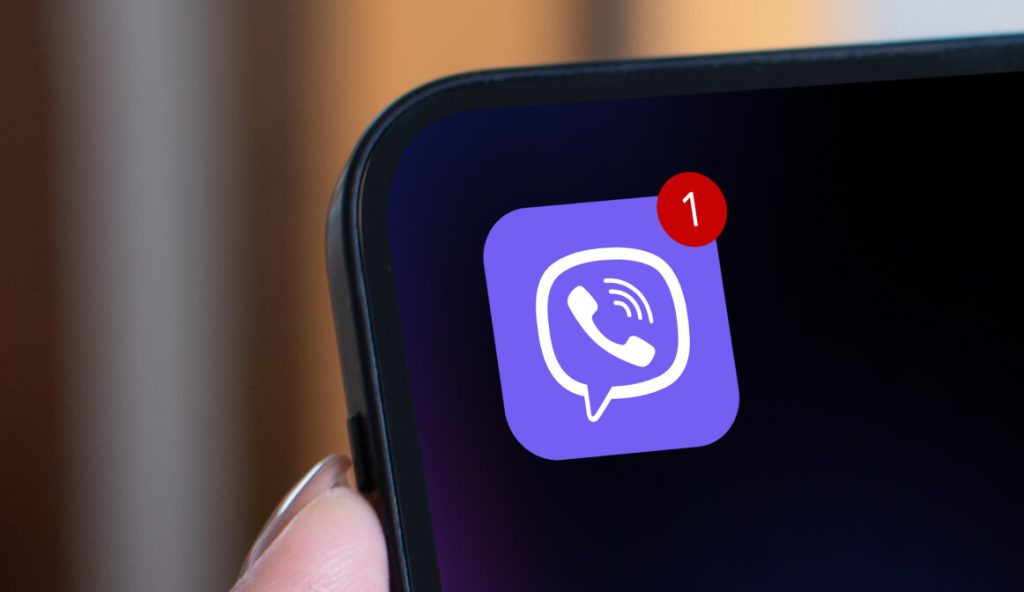 Mockup, woman's hand holding using mobile phone at coffee shop with copy space, white blank screen for text, mobile app design and advertsing, online marketing